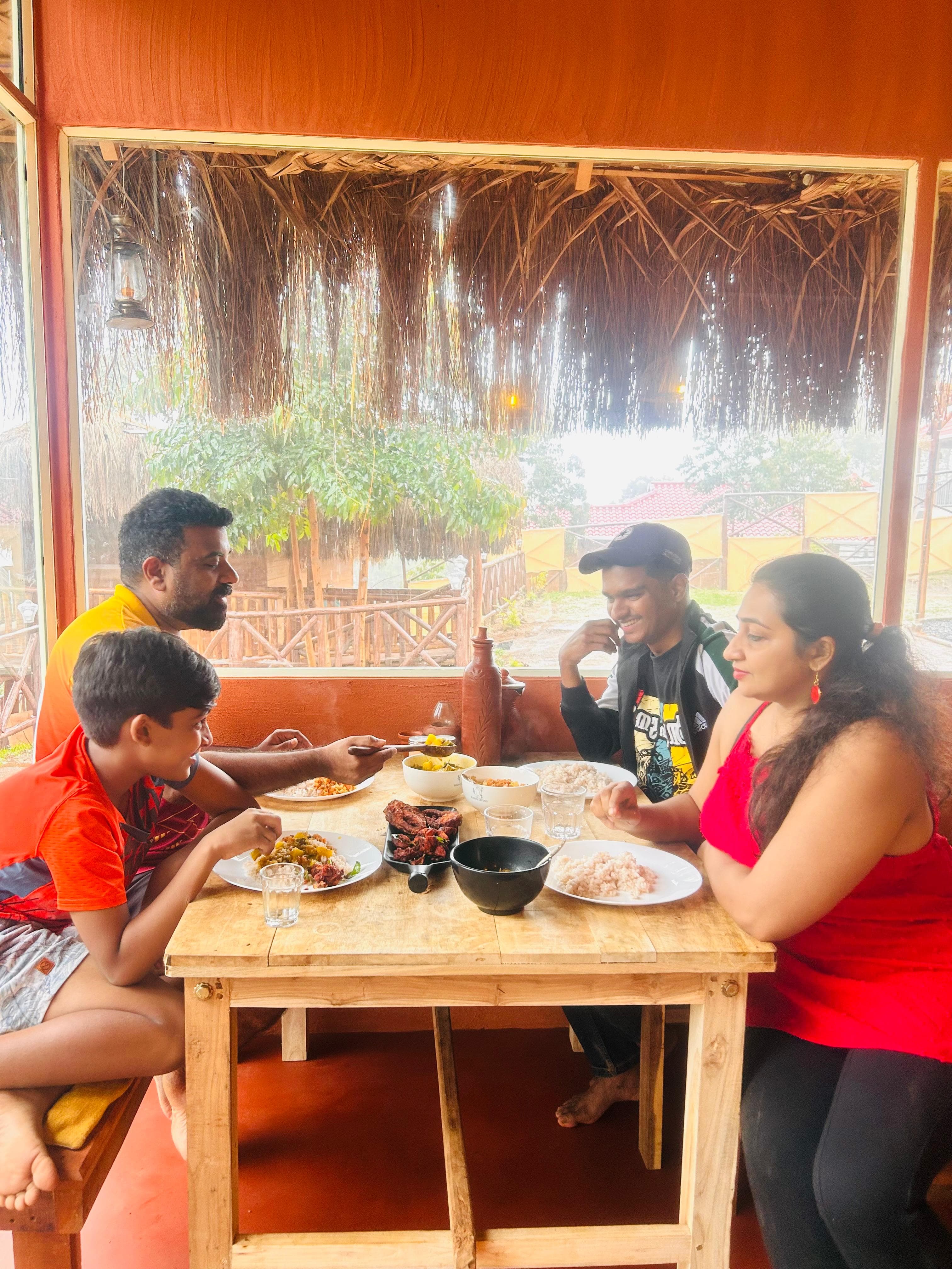 A family sharing a home-cooked meal at a wooden table